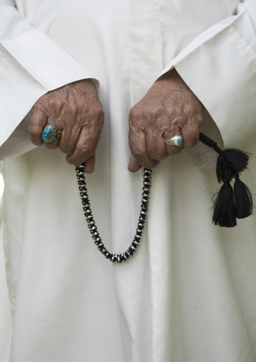Man counting muslim prayer beads, Fars province, Shiraz, Iran
