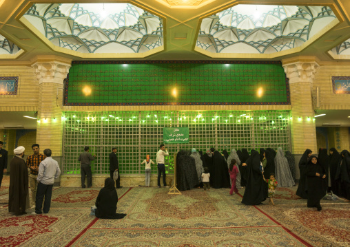 Pilgrims praying in front of the ayatollah khomeini mausoleum, Shemiranat county, Behesht-e zahra, Iran