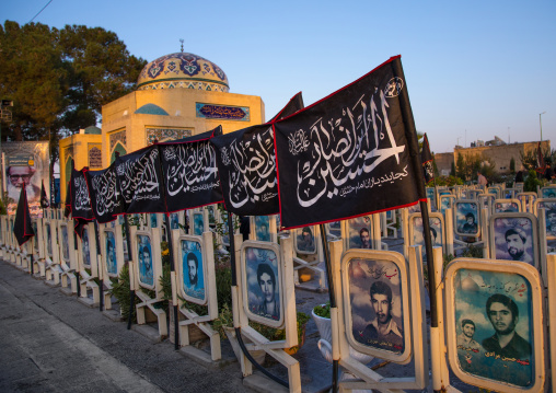 Black flags to commemorate Muharram in the Rose garden of martyrs cemetery, Isfahan Province, Isfahan, Iran
