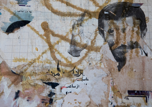 Old teared poster of Mahmoud Ahmadinejad, Isfahan Province, Nain, Iran