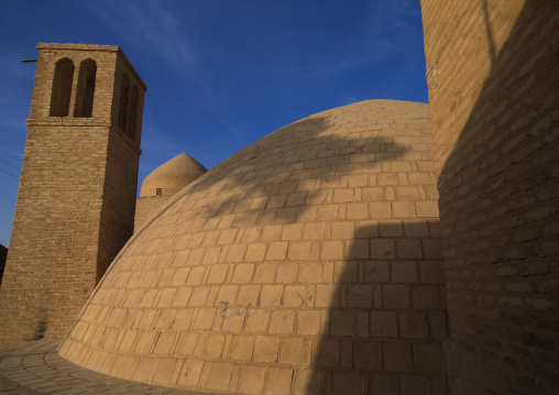 Wind towers used as a natural cooling system for water reservoir in iranian traditional architecture, Isfahan Province, Ardestan, Iran