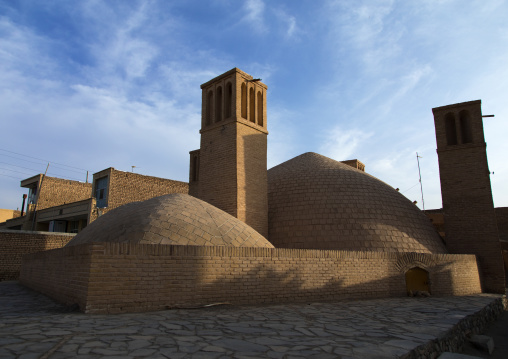 Wind towers used as a natural cooling system for water reservoir in iranian traditional architecture, Isfahan Province, Ardestan, Iran