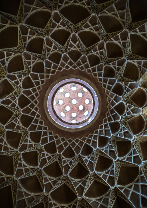 A beautifully adorned ceiling of the hall in Boroujerdi historical house, Isfahan Province, Kashan, Iran