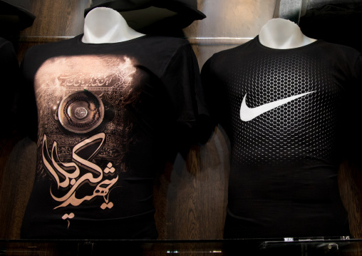 T-shirt with a logo for Muharram near a Nike one, Isfahan Province, Kashan, Iran