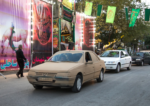 Peugeot car decorated with mud for Ashura commemoration, Lorestan Province, Khorramabad, Iran