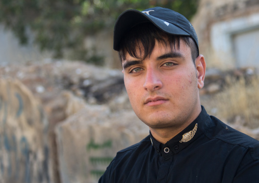 Iranian shiite muslim man mourning Imam Hussein on Tasua during the Chehel Manbar ceremony one day before Ashura, Lorestan Province, Khorramabad, Iran