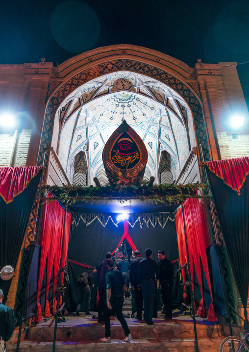 Entrance of an Hosseinieh decorated for Muharram where shiite men come to worship Imam Hussein, Isfahan Province, Kashan, Iran