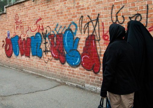 anti-american mural propoganda on the wall of the former united states embassy saying down with usa, Central district, Tehran, Iran