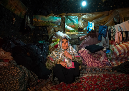 old woman in her troglodyte house, Kerman province, Meymand, Iran
