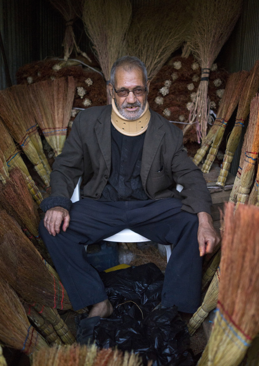Old Man Selling Brooms In The Bazaar, Kermanshah, Iran