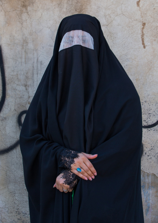 Iranian Shiite Muslim Woman Mourning Imam Hussein On The Day Of Tasua With Her Face Covered By A Veil, Lorestan Province, Khorramabad, Iran