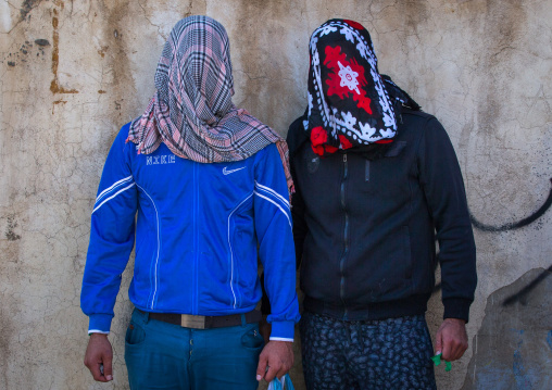 Iranian Shiite Muslim Men Mourning Imam Hussein On The Day Of Tasua With Their Faces Covered By A Scarf, Lorestan Province, Khorramabad, Iran