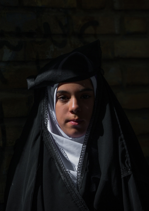 An Iranian Shiite Girl With Veil Lift Up During Tasua Celebrations One Day Before Ashura, Lorestan Province, Khorramabad, Iran