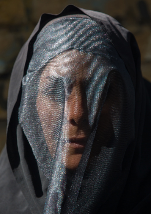 Iranian Shiite Muslim Woman Mourning Imam Hussein On The Day Of Tasua With Her Face Covered By A Veil, Lorestan Province, Khorramabad, Iran