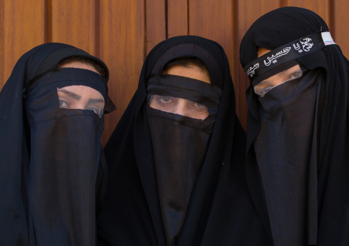 Iranian Shiite Muslim Women Mourning Imam Hussein On The Day Of Tasua With Their Faces Covered By A Veil, Lorestan Province, Khorramabad, Iran