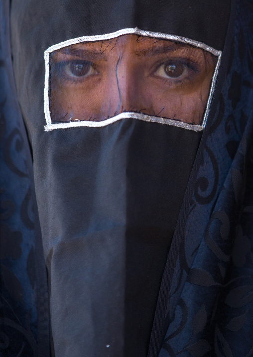 Iranian Shiite Muslim Woman Mourning Imam Hussein On The Day Of Tasua With Her Face Covered By A Veil, Lorestan Province, Khorramabad, Iran