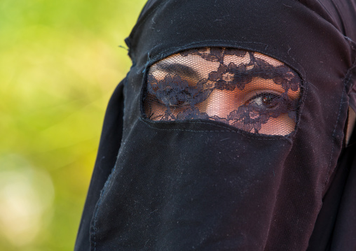 Iranian Shiite Muslim Woman Mourning Imam Hussein On The Day Of Tasua With Her Face Covered By A Veil, Lorestan Province, Khorramabad, Iran