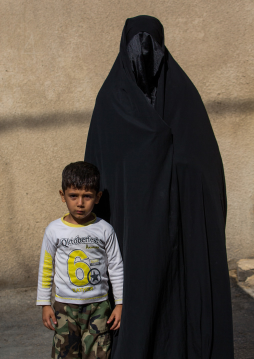 A Shiite Muslim Woman Mourning Imam Hussein On The Day Of Tasua With Her Face Covered By A Veil, Lorestan Province, Khorramabad, Iran