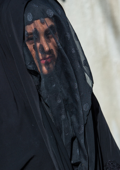 Iranian Shiite Muslim Woman Mourning Imam Hussein On The Day Of Tasua With Her Face Covered By A Veil, Lorestan Province, Khorramabad, Iran
