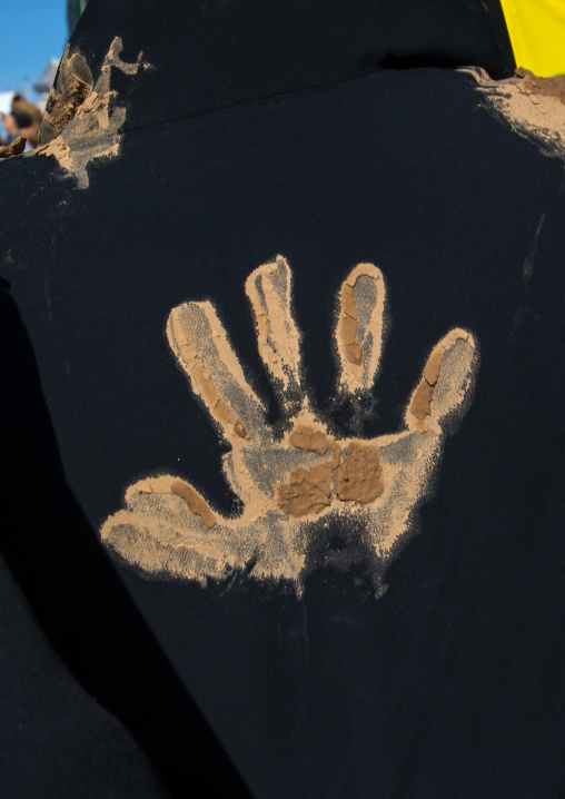 Iranian Shiite Muslim Woman With A Mud Handprint On Her Back During Ashura, The Day Of The Death Of Imam Hussein, Kurdistan Province, Bijar, Iran