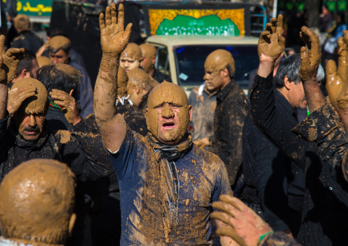 Iranian Shiite Muslim Men Covered In Mud, Chanting And Self-flagellating During Ashura, The Day Of The Death Of Imam Hussein, Kurdistan Province, Bijar, Iran