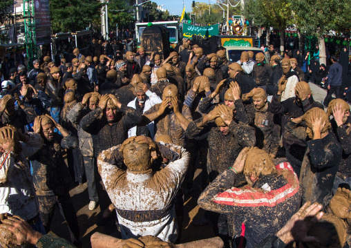 Iranian Shiite Muslim Men Covered In Mud, Chanting And Self-flagellating During Ashura, The Day Of The Death Of Imam Hussein, Kurdistan Province, Bijar, Iran