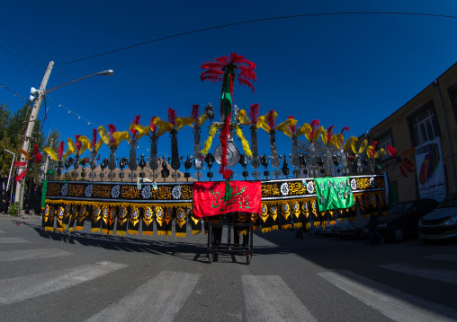Iranian Shiite Muslim Men Carry An Alam On Ashura, The Day Of The Death Of Imam Hussein, Kurdistan Province, Bijar, Iran