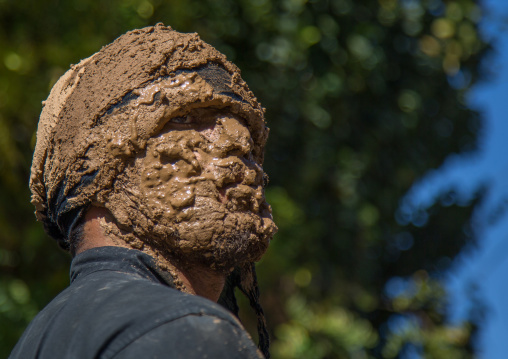 Iranian Shiite Muslim Man Covered In Mud During Ashura, The Day Of The Death Of Imam Hussein, Kurdistan Province, Bijar, Iran
