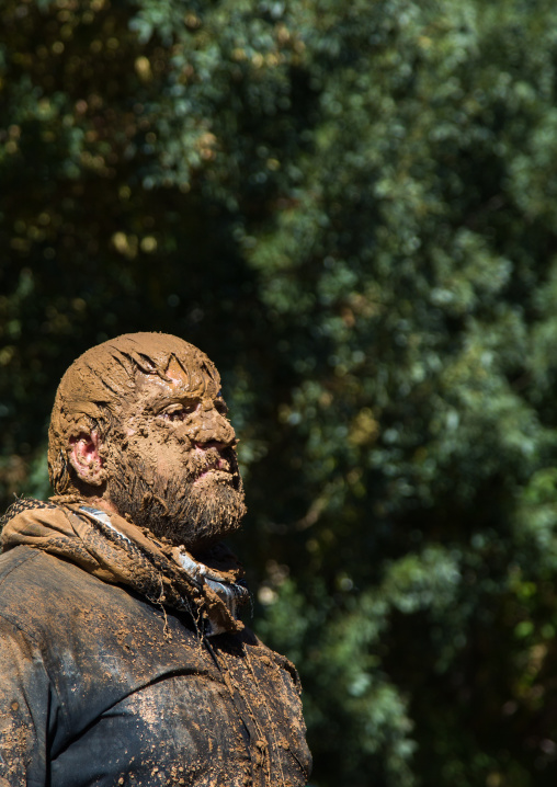 Iranian Shiite Muslim Man Covered In Mud During Ashura, The Day Of The Death Of Imam Hussein, Kurdistan Province, Bijar, Iran