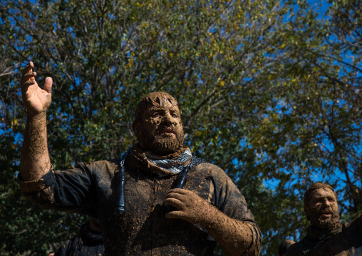 Iranian Shiite Muslim Man Covered In Mud, Chanting And Self-flagellating During Ashura Day, Kurdistan Province, Bijar, Iran