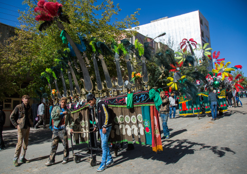 An Iranian Man Carries An Alam Is Helped By Shiite Muslim Mourners To Keep His Balance On Ashura, The Day Of The Death Of Hussein, Kurdistan Province, Bijar, Iran
