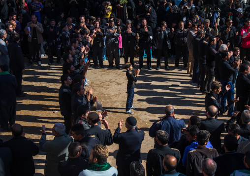Iranian Shiite Muslim Boy Beating Himslef In The Middle Of Men Celebrating Ashura, The Day Of The Death Of Imam Hussein, Kurdistan Province, Bijar, Iran