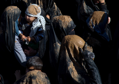 Iranian Shiite Muslim Women Covered In Mud, Chanting And Self-flagellating During Ashura, The Day Of The Death Of Imam Hussein, Kurdistan Province, Bijar, Iran