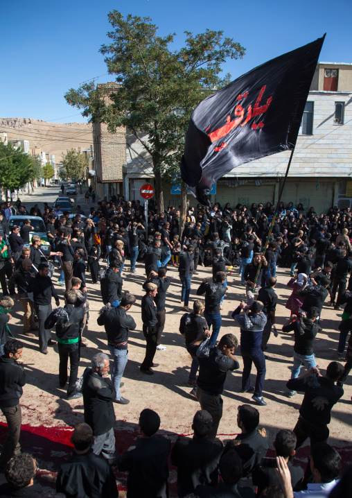Iranian Shiite Men Covered In Mud Are Beating Themselves With Iron Chains During Ashura, The Day Of The Death Of Imam Hussein, Kurdistan Province, Bijar, Iran