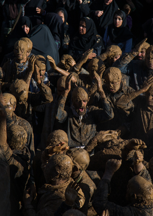 Iranian Shiite Muslim Men Covered In Mud, Chanting And Self-flagellating During Ashura, The Day Of The Death Of Imam Hussein, Kurdistan Province, Bijar, Iran
