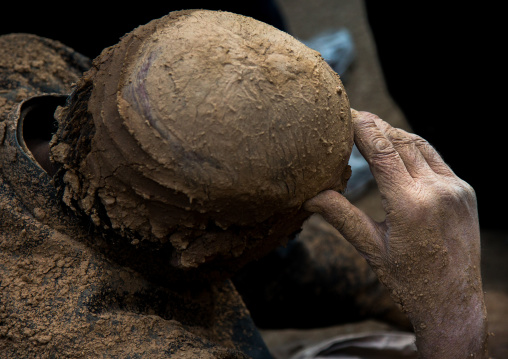 Iranian Shiite Muslim Man Covered In Mud Crying During Ashura Day, Kurdistan Province, Bijar, Iran