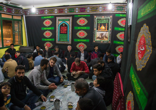 Iranian Shiite Muslim Men Having A Nazri Charity Diner During Muharram Before Ashura Celebrations, Golestan Province, Gorgan, Iran