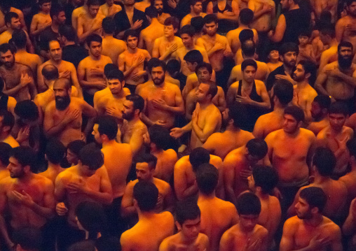 Iranian Shiite Muslim Mourners From The Mad Of Hussein Community Chanting And Self-flagellating During Muharram, Isfahan Province, Kashan, Iran