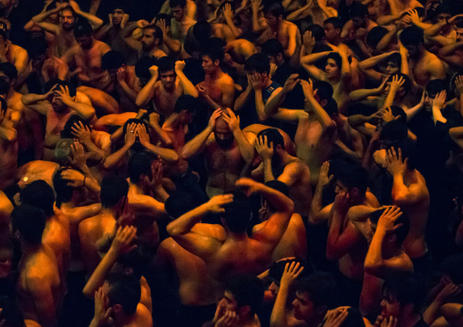 Iranian Shiite Muslim Mourners From The Mad Of Hussein Community Chanting And Self-flagellating During Muharram, Isfahan Province, Kashan, Iran