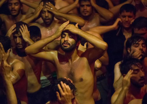 Iranian Shiite Muslim Mourners From The Mad Of Hussein Community Chanting And Self-flagellating During Muharram, Isfahan Province, Kashan, Iran