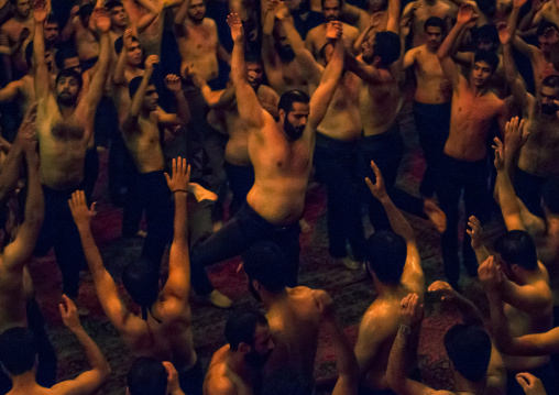 Iranian Shiite Muslim Mourners From The Mad Of Hussein Community Chanting And Self-flagellating During Muharram, Isfahan Province, Kashan, Iran