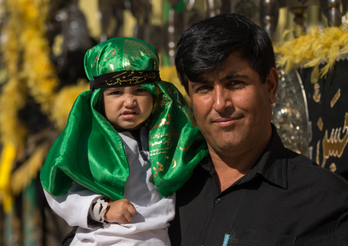 An Iranian Shiite Father And Child During Tasua Celebrations One Day Before Ashura, Lorestan Province, Khorramabad, Iran