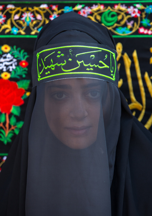 Iranian Shiite Muslim Woman Mourning Imam Hussein On The Day Of Tasua With Her Face Covered By A Veil, Lorestan Province, Khorramabad, Iran