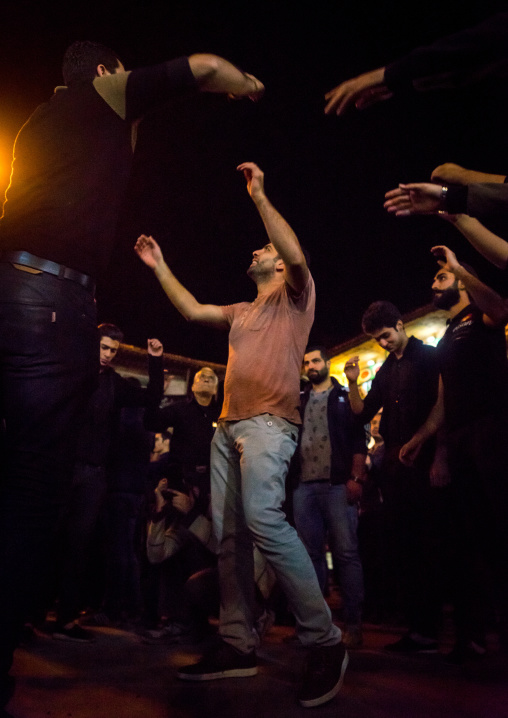 Iranian Shiite Muslim Men Chanting And Self-flagellating During Ashura, The Day Of The Death Of Imam Hussein, Golestan Province, Gorgan, Iran