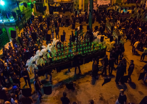 Iranian Shiite Muslim Men Mourners With An Alam In A Mosque Courtyard On Ashura, The Day Of The Death Of Imam Hussein, Golestan Province, Gorgan, Iran