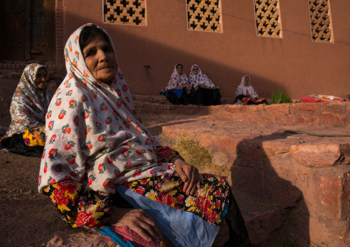 Portrait Of Iranian Women Wearing Traditional Floreal Chadors In Zoroastrian Village, Isfahan Province, Abyaneh, Iran