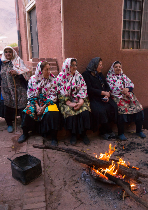 Portrait Of Iranian Women Wearing Traditional Floreal Chadors In Zoroastrian Village, Isfahan Province, Abyaneh, Iran