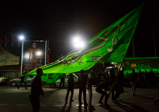 Iranian Shiite Muslims Men Parading With Green Flag During Ashura, The Day Of The Death Of Imam Hussein, Isfahan Province, Kashan, Iran