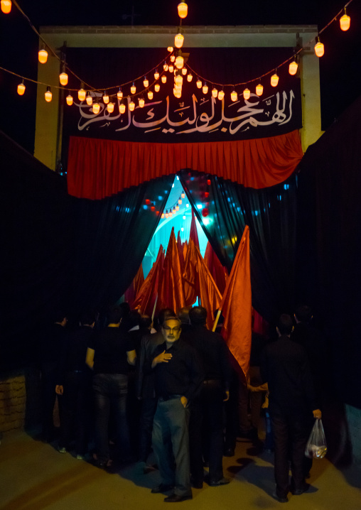 Iranian Shiite Muslims Men Parading With Red Flags During Ashura, The Day Of The Death Of Imam Hussein, Isfahan Province, Kashan, Iran