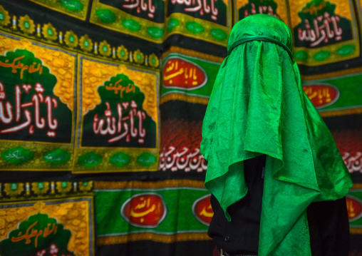 Iranian Young Man With Green Veil Covering His Face During Chehel Menbari Festival On Tasua To Commemorate The Martyrdom Of Hussein, Lorestan Province, Khorramabad, Iran